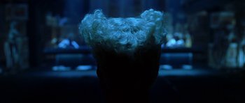 Movie still from “Zoolander” (2001), directed by Ben Stiller – View of the hair of a person's head; Close Up shot, Over the shoulder angle