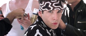 Movie still from “Zoolander” (2001), directed by Ben Stiller – A person wearing a head band; Close Up shot, Over the shoulder angle