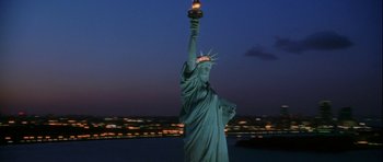 Movie still from “Zoolander” (2001), directed by Ben Stiller – The statue of liberty is lit up at night; Extreme Wide shot, Low angle
