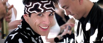 Movie still from “Zoolander” (2001), directed by Ben Stiller – A person wearing a headband; Close Up shot, Over the shoulder angle