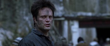 Movie still from “Zoolander” (2001), directed by Ben Stiller – A person wearing a black shirt; Close Up shot, Over the shoulder angle