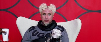 Movie still from “Zoolander” (2001), directed by Ben Stiller – A man in a wig and a sweater with white curly hair; Close Up shot, Low angle