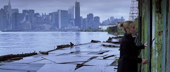 Movie still from “Zoolander” (2001), directed by Ben Stiller – A view of a city from the shore of a body of water; Wide shot, Over the shoulder angle