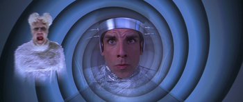 Movie still from “Zoolander” (2001), directed by Ben Stiller – A man in a space suit looking into the camera; Close Up shot, Overhead angle