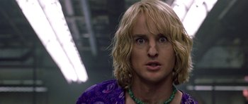 Movie still from “Zoolander” (2001), directed by Ben Stiller – A person with long blonde hair; Close Up shot, Low angle