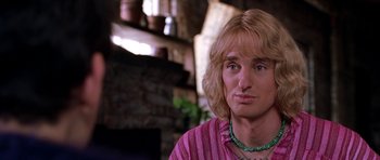 Movie still from “Zoolander” (2001), directed by Ben Stiller – A person with long blonde hair; Close Up shot, Over the shoulder angle