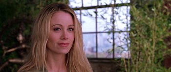 Movie still from “Zoolander” (2001), directed by Ben Stiller – A woman with long blonde hair and blue eyes; Close Up shot, Over the shoulder angle