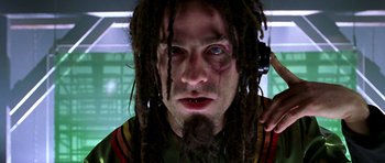 Movie still from “Zoolander” (2001), directed by Ben Stiller – A person with dreadlocks; Close Up shot, Low angle