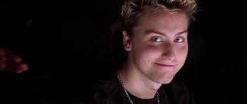 Movie still from “Zoolander” (2001), directed by Ben Stiller – A person wearing a black shirt; Close Up shot, Low angle