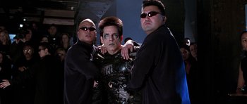 Movie still from “Zoolander” (2001), directed by Ben Stiller – A group of men standing next to each other; Medium shot, High angle