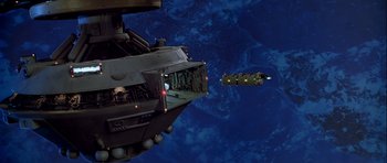 Movie still from “Star Trek: The Motion Picture” (1979), directed by Robert Wise – A space ship is flying in the air; Extreme Wide shot, High angle