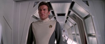 Movie still from “Star Trek: The Motion Picture” (1979), directed by Robert Wise – A man in a uniform standing in a tunnel; Close Up shot, Low angle