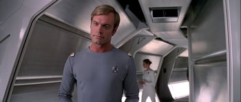 Movie still from “Star Trek: The Motion Picture” (1979), directed by Robert Wise – A man and a woman are standing in a room together; Close Up shot, Over the shoulder angle