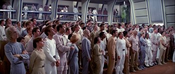 Movie still from “Star Trek: The Motion Picture” (1979), directed by Robert Wise – A group of people standing next to each other; Wide shot, High angle