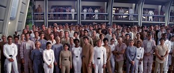 Movie still from “Star Trek: The Motion Picture” (1979), directed by Robert Wise – A large group of people in white uniforms; Wide shot, High angle