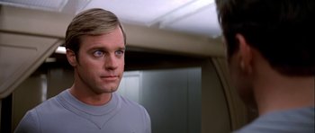 Movie still from “Star Trek: The Motion Picture” (1979), directed by Robert Wise – A man with blue eyes looking into a mirror; Close Up shot, Over the shoulder angle