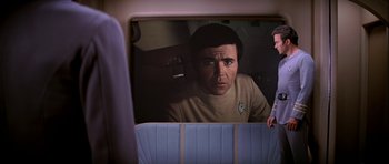 Movie still from “Star Trek: The Motion Picture” (1979), directed by Robert Wise – A painting of a man looking at himself in the mirror; Medium shot, Over the shoulder angle