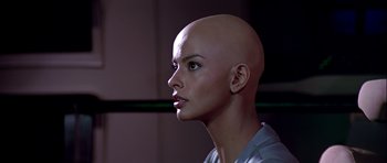 Movie still from “Star Trek: The Motion Picture” (1979), directed by Robert Wise – A mannequin with a bald head is looking into the distance; Close Up shot, High angle