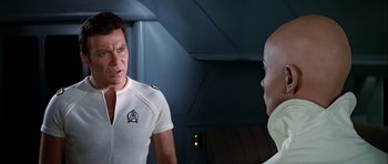 Movie still from “Star Trek: The Motion Picture” (1979), directed by Robert Wise – A man and a woman are talking to each other in a room; Close Up shot, Over the shoulder angle