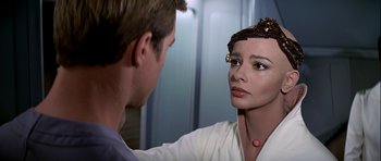 Movie still from “Star Trek: The Motion Picture” (1979), directed by Robert Wise – A man and a woman looking into a mirror; Close Up shot, Over the shoulder angle