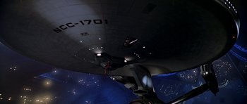 Movie still from “Star Trek: The Motion Picture” (1979), directed by Robert Wise – A view of the inside of a space ship from below; Extreme Wide shot, Overhead angle
