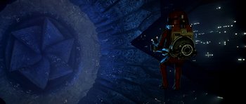 Movie still from “Star Trek: The Motion Picture” (1979), directed by Robert Wise – An image of a man in a space suit; Extreme Wide shot, Overhead angle