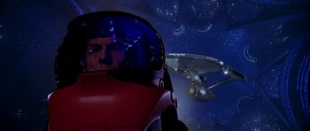 Movie still from “Star Trek: The Motion Picture” (1979), directed by Robert Wise – An image of a man in a space suit; Medium shot, Overhead angle