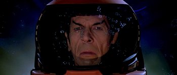 Movie still from “Star Trek: The Motion Picture” (1979), directed by Robert Wise – A person wearing a space helmet; Close Up shot, Over the shoulder angle