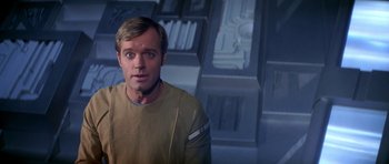 Movie still from “Star Trek: The Motion Picture” (1979), directed by Robert Wise – A person wearing a shirt; Close Up shot, Over the shoulder angle