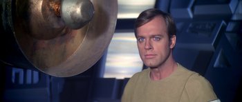 Movie still from “Star Trek: The Motion Picture” (1979), directed by Robert Wise – A person standing next to a cymbal; Close Up shot, Low angle