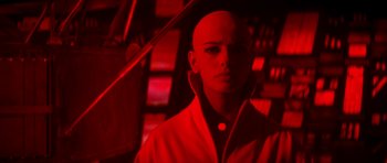 Movie still from “Star Trek: The Motion Picture” (1979), directed by Robert Wise – A man with a bald head is standing under an umbrella; Close Up shot, Over the shoulder angle