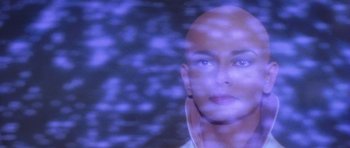 Movie still from “Star Trek: The Motion Picture” (1979), directed by Robert Wise – A man with blue eyes is looking at the camera; Close Up shot, Over the shoulder angle