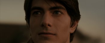 Movie still from “Superman Returns” (2006), directed by Bryan Singer – A young man's face with blue eyes; Close Up shot, Over the shoulder angle