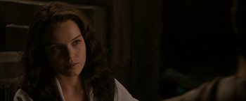 Movie still from “Superman Returns” (2006), directed by Bryan Singer – A woman sitting in front of a window; Close Up shot, Over the shoulder angle