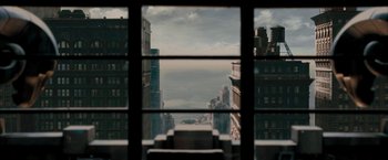 Movie still from “Superman Returns” (2006), directed by Bryan Singer – Looking out a window at a city skyline; Extreme Wide shot, High angle