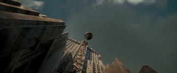 Movie still from “Superman Returns” (2006), directed by Bryan Singer – An image of an upside down object in the sky; Extreme Wide shot, Low angle