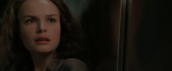 Movie still from “Superman Returns” (2006), directed by Bryan Singer – A woman's face with long brown hair; Close Up shot, High angle