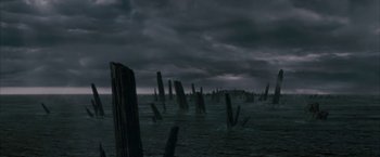 Movie still from “Superman Returns” (2006), directed by Bryan Singer – A dark picture of a body of water; Extreme Wide shot, Low angle