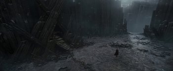 Movie still from “Superman Returns” (2006), directed by Bryan Singer – An image of a person walking in the rain; Extreme Wide shot, High angle