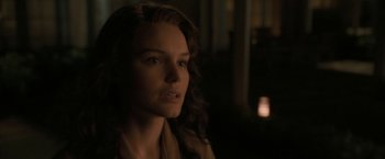 Movie still from “Superman Returns” (2006), directed by Bryan Singer – A person with long brown hair; Close Up shot, Over the shoulder angle