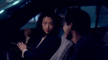 Movie still from “Eat Drink Man Woman” (1994), directed by Ang Lee – A woman sitting next to a man in the back of a car; Close Up shot, Over the shoulder angle