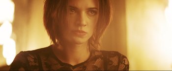 Movie still from “xXx” (2002), directed by Rob Cohen – A person wearing a black shirt; Close Up shot, Low angle