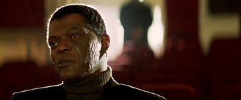 Movie still from “xXx” (2002), directed by Rob Cohen – A person with a face mask on; Close Up shot, Low angle
