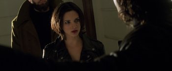 Movie still from “xXx” (2002), directed by Rob Cohen – A woman looking at her reflection in a mirror; Close Up shot, Over the shoulder angle