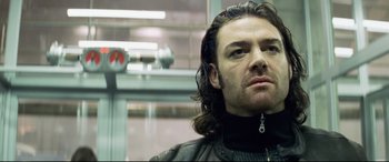 Movie still from “xXx” (2002), directed by Rob Cohen – A person with long hair; Close Up shot, Low angle