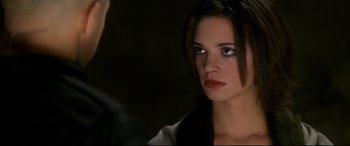 Movie still from “xXx” (2002), directed by Rob Cohen – A person wearing a jacket; Close Up shot, Over the shoulder angle