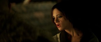 Movie still from “xXx” (2002), directed by Rob Cohen – A person looking down at something; Close Up shot, Over the shoulder angle