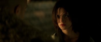 Movie still from “xXx” (2002), directed by Rob Cohen – A person wearing a jacket looking at the camera; Close Up shot, Over the shoulder angle