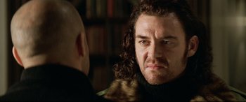 Movie still from “xXx” (2002), directed by Rob Cohen – A person wearing a jacket; Close Up shot, Low angle