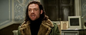 Movie still from “xXx” (2002), directed by Rob Cohen – A person wearing a jacket; Close Up shot, Low angle